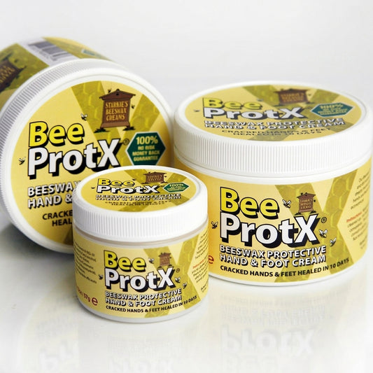 Three tubs of BeeProtX Beeswax Protective Hand & Foot Cream arranged on a white reflective surface. The labels are yellow and white with prominent 'Bee ProtX' branding and product details.