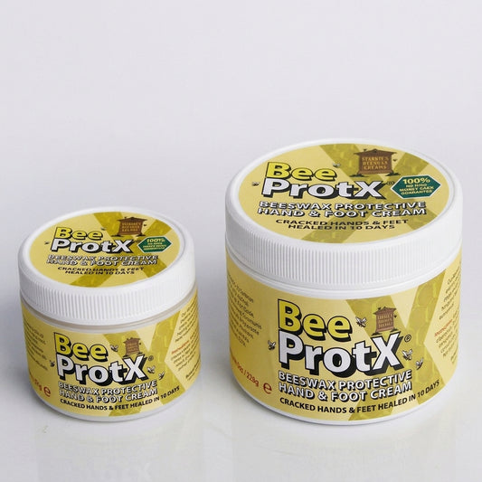 Two tubs of BeeProtX Beeswax Protective Hand & Foot Cream shown on a clean white background, with one small jar and one larger jar displaying the product packaging.