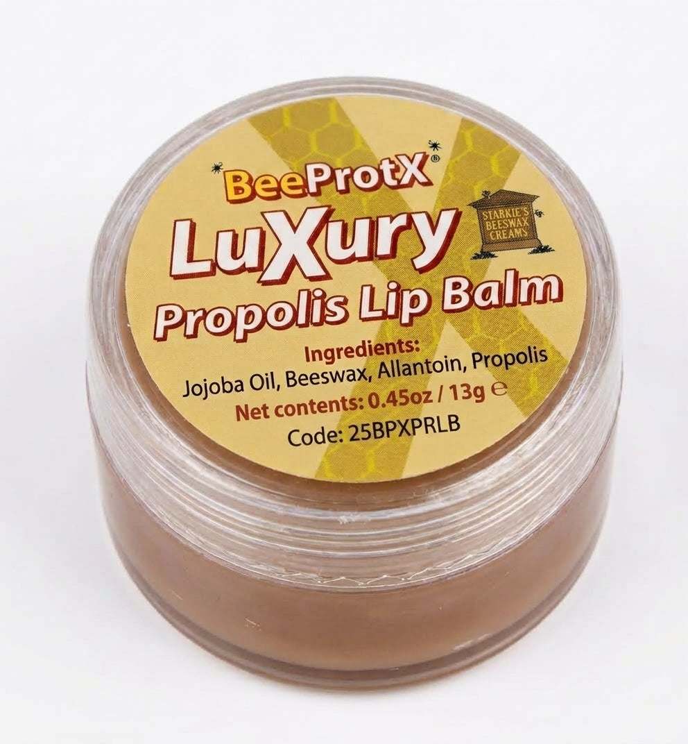 A clear plastic jar of BeeProtX Luxury Propolis Lip Balm with a yellow honeycomb-patterned label, containing a brown balm, on a white background.
