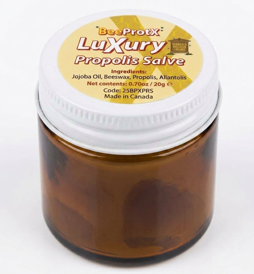 An amber glass jar of BeeProtX Luxury Propolis Salve with a white screw cap and a yellow label, shown on a white background.