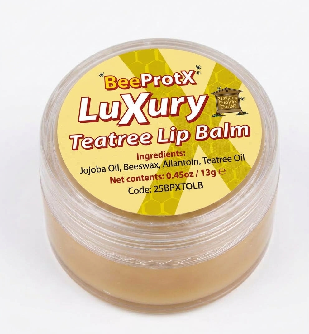 A clear plastic jar of BeeProtX Luxury Teatree Lip Balm, showing the light tan balm inside and a yellow label with red and black text.